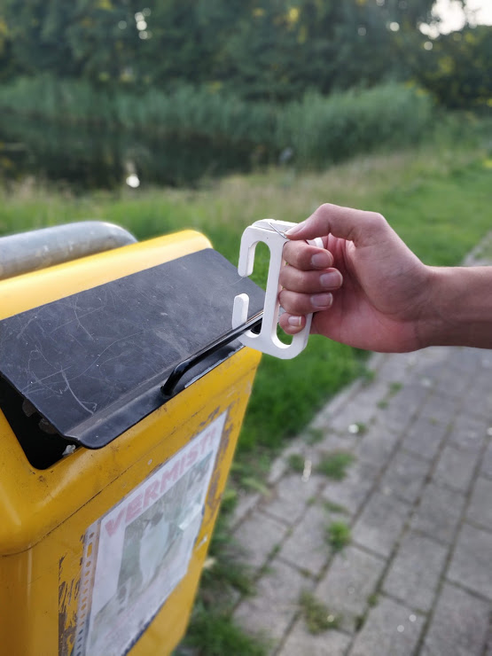 Corona grabber on trash can